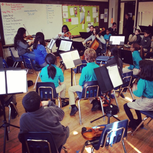 YOLA musicians Arlette Romero, Laura Garcia, Jammaiya Penn, and Heaven Aguilar performing for the "Abbado Orchestra" at the Conservatory Lab Charter School.