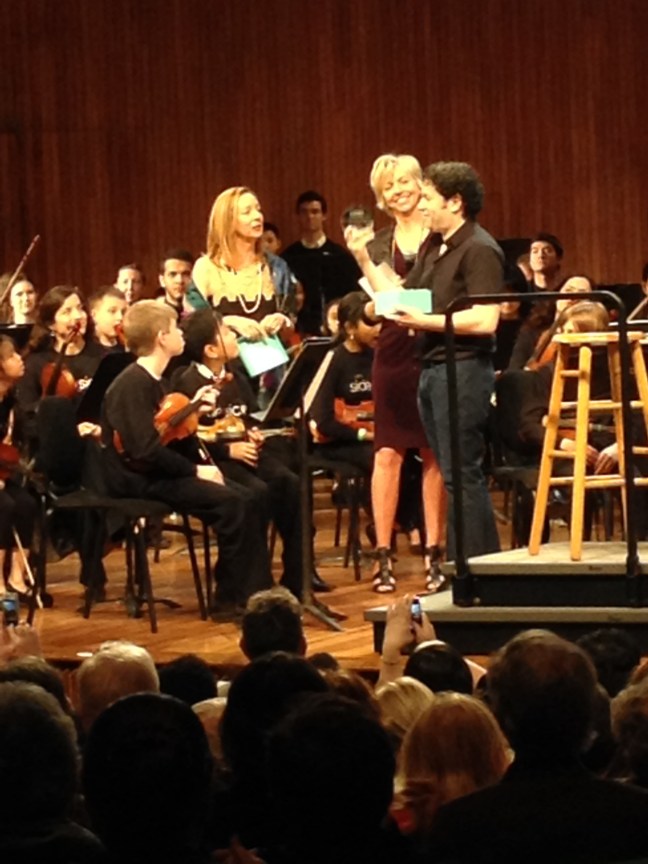 Gustavo Dudamel receiving the Bernstein Lifetime Achievement Award, from Jamie Bernstein (Lenny's daughter) and Longy School of Music president Karen Zorn.